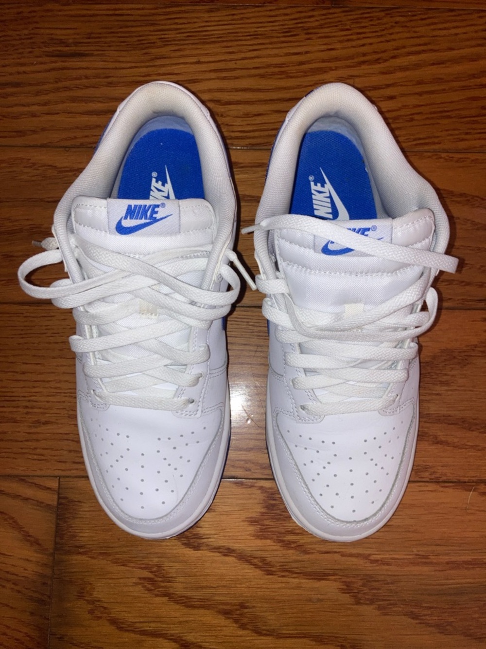 Nike White Low-Top Sneakers with Blue Accents